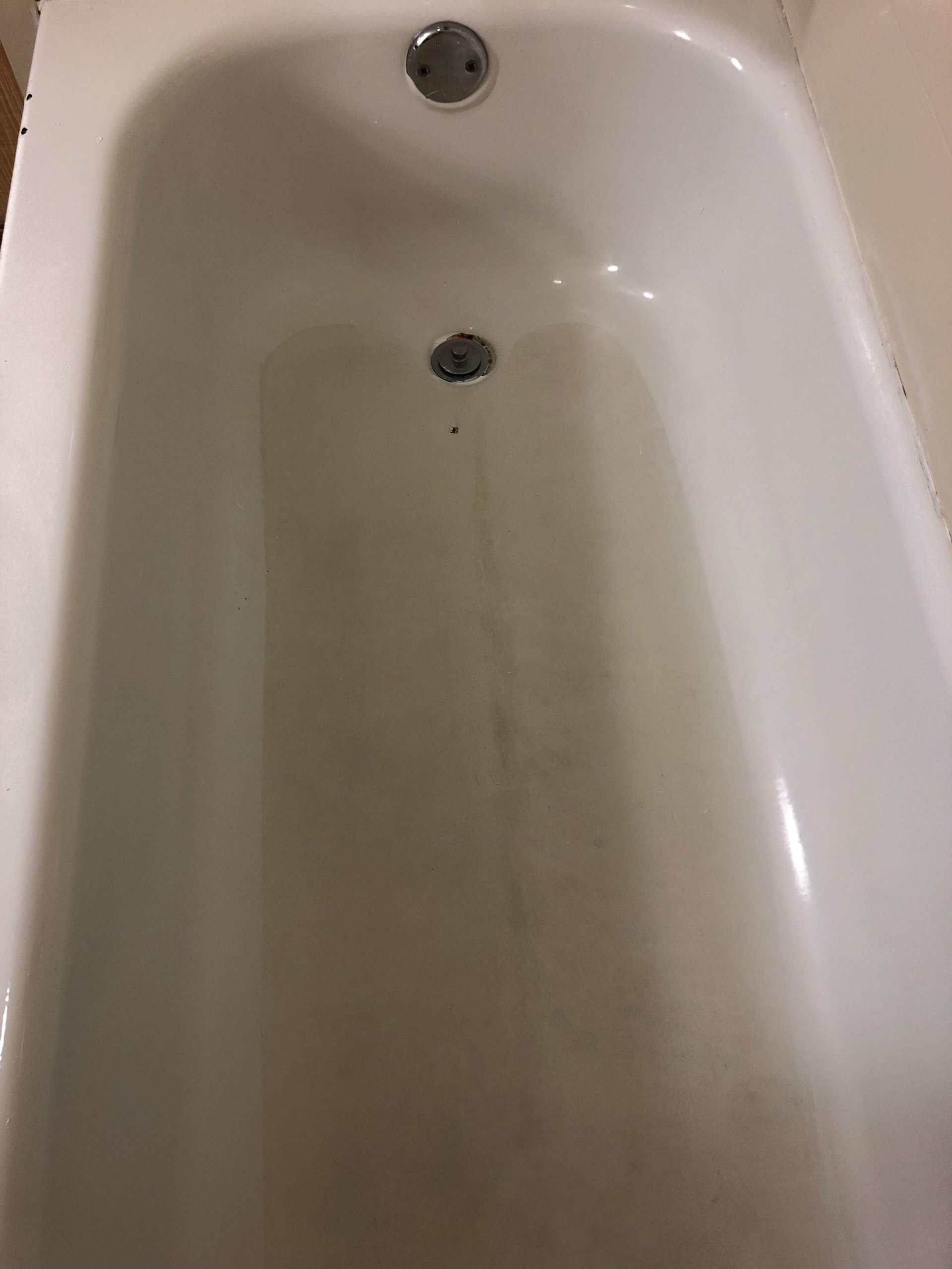 worn bathtub before