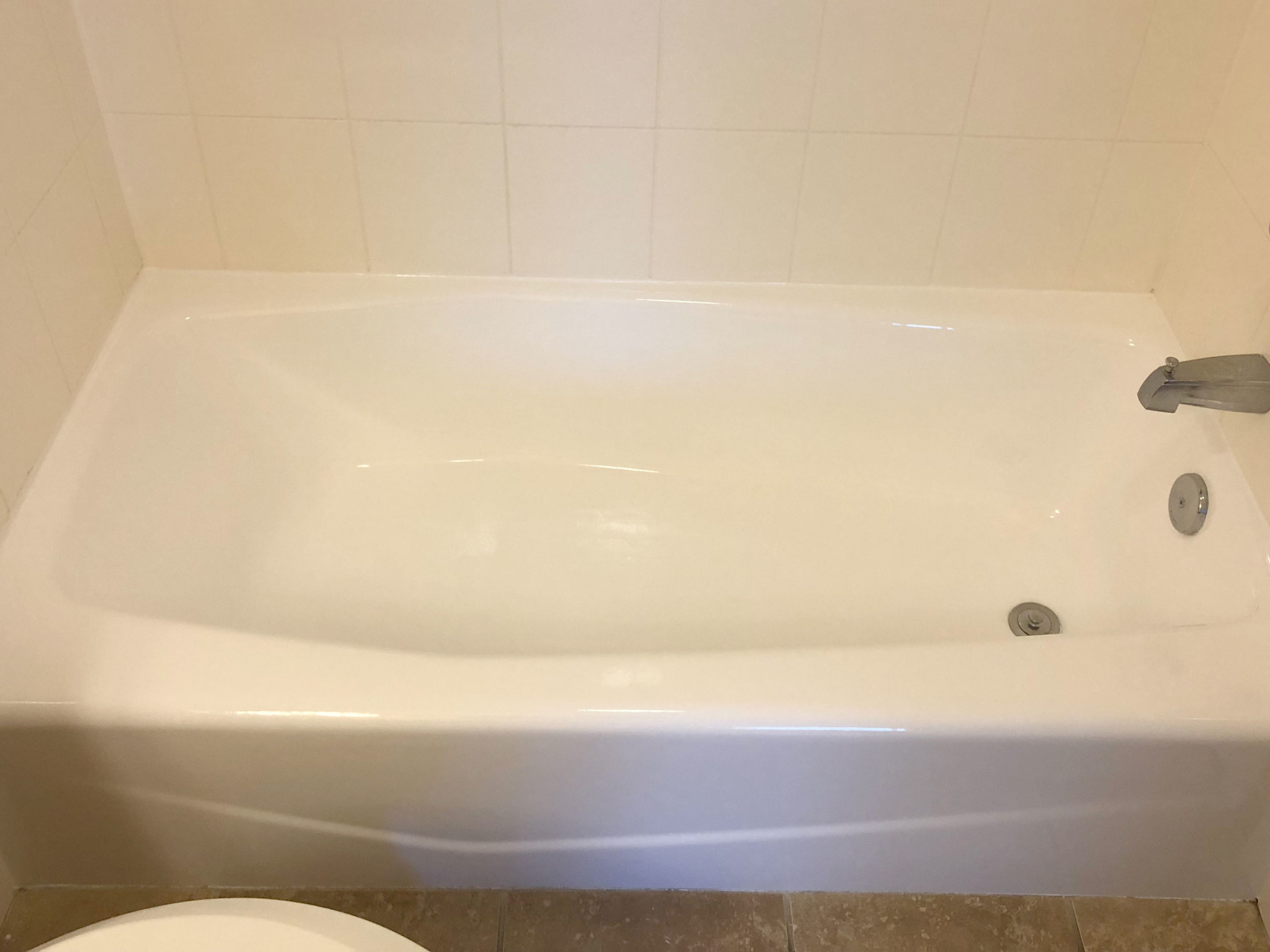 Chipped and peeling tub after
