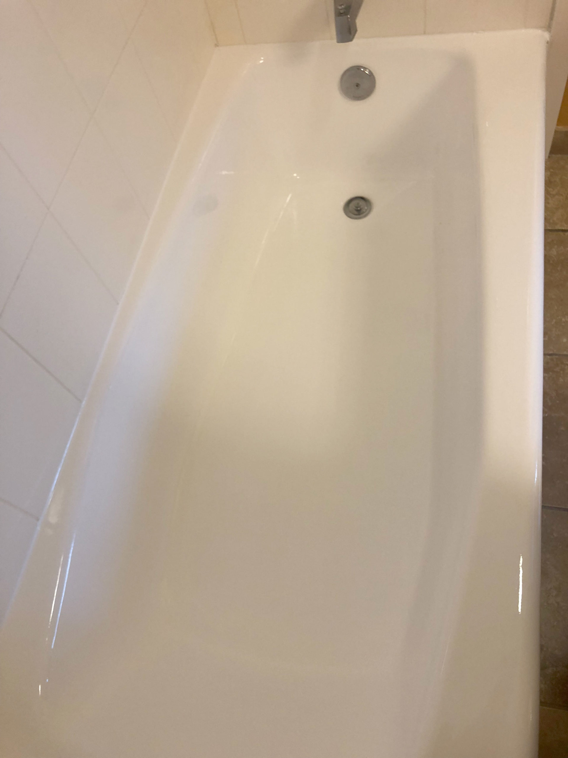Chipped and peeling tub after